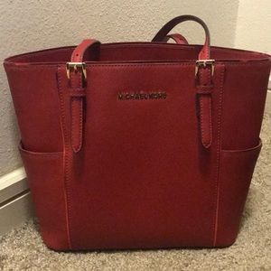 Red Michael Kors tote purse